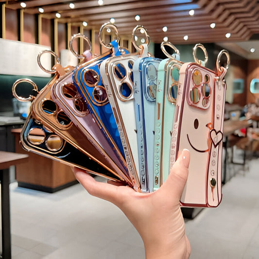 جراب مطلي بالكهرباء من مادة TPU الناعمة بتصميم وجه مبتسم متوافق مع [iPhone 16، 16Plus، 16Pro، 16ProMax مع حلقة وحزام مسند وحواف مرتفعة لـ&gt;&gt; (وردي، iPhone 16 Pro)